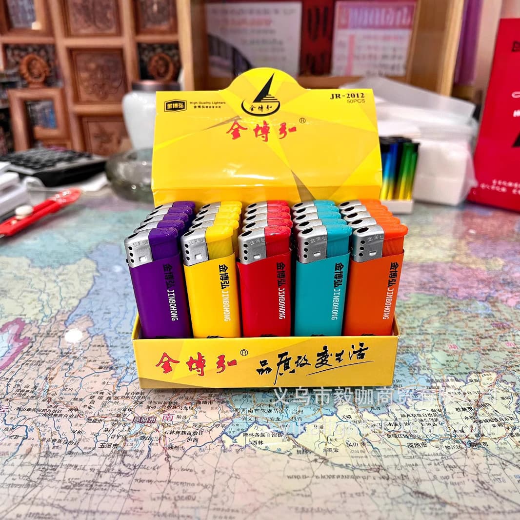 New model Lion King five-color wrapped paper open flame lighter, thickened body, factory direct sale wholesale at competitive prices