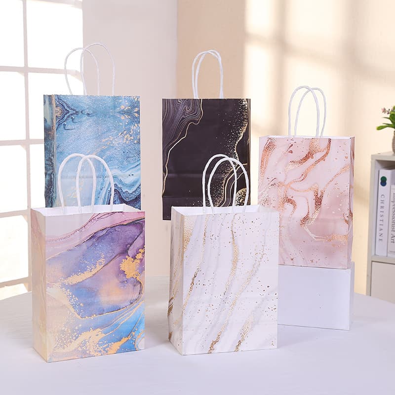 Factory wholesale kraft paper handbags for parties, gifts, candy bags, customizable