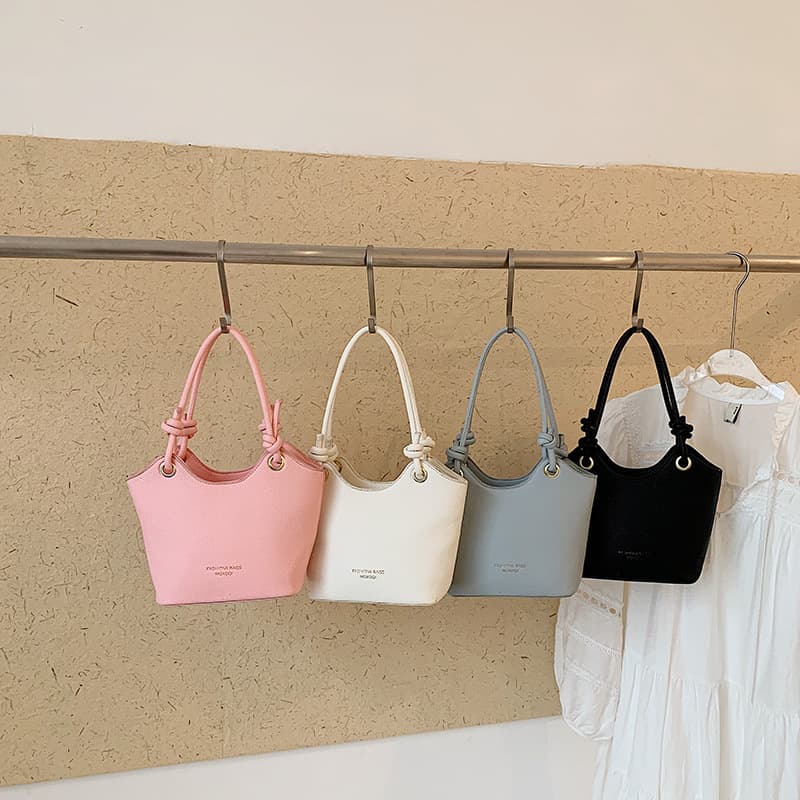 2026 Summer Solid Color New Simple Fashion Pendant Western Style Female Design Commuting Crossbody Handheld Bucket Bag