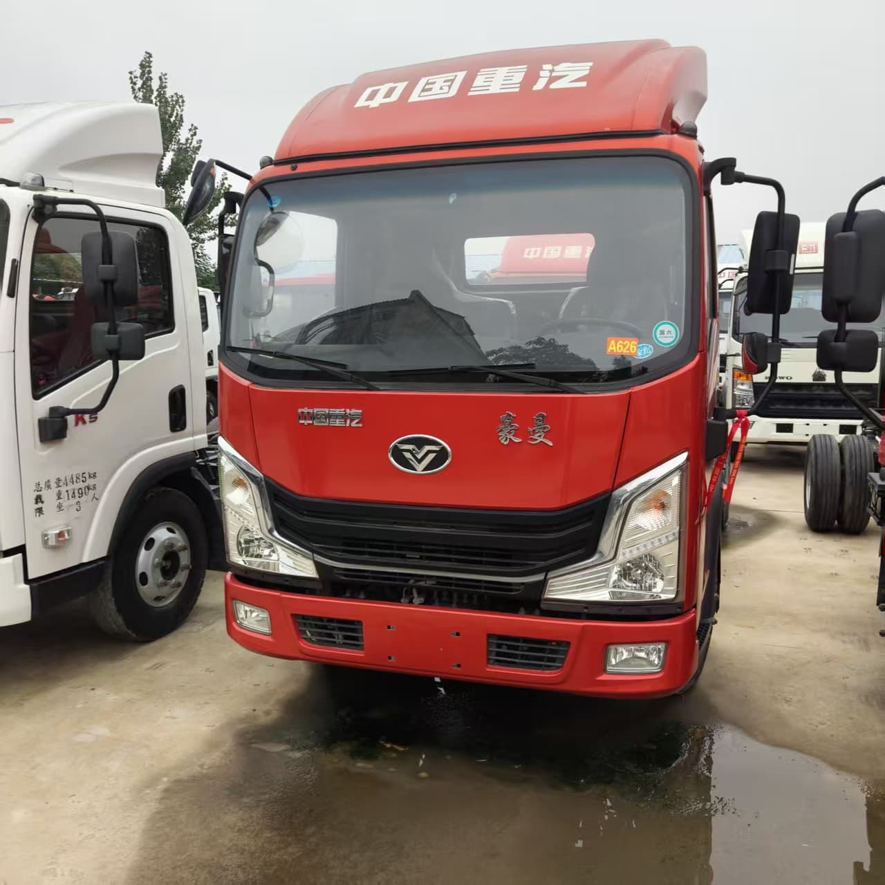 Sinotruk Haoman Flatbed Truck Chengli Flatbed Truck Manufacturer Direct Sales Price Transport 75 135 Excavator Trailer Truck
