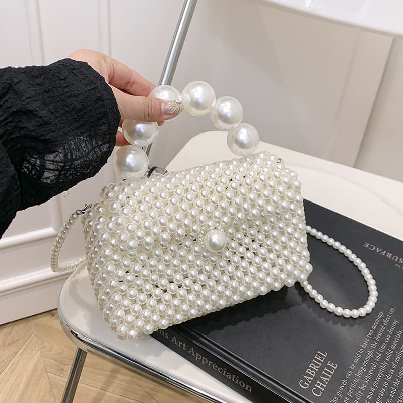 Summer Small Bag 2025 New Mori Soft Girl Fashion Hollow Woven Bag Chanel Pearl Portable Beach Bag