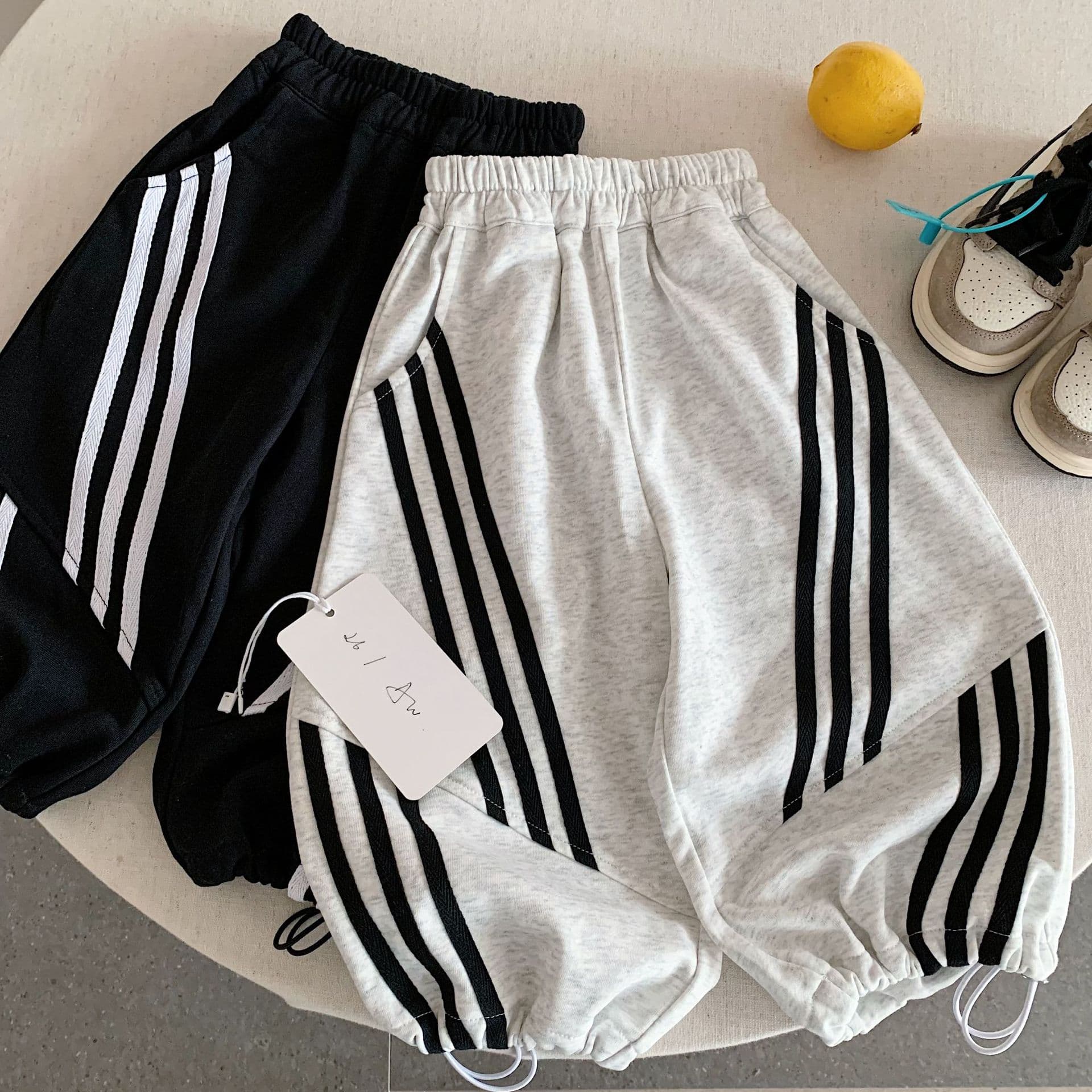 Children's trousers 2026 autumn new products boys and girls pull-up Korean style bloomers baby drawstring leggings versatile and trendy