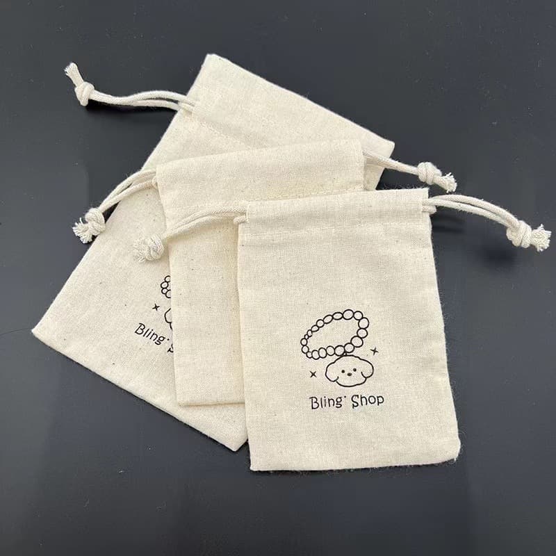Factory wholesale eco-friendly pure cotton drawstring bags for bracelet and collectible packaging, gift dust-proof storage, with free samples available.