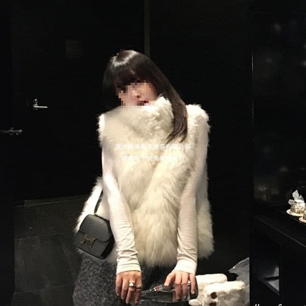 A structured, flattering vest with dropped shoulders that suits all heights; versatile and stylish; eco-friendly faux fur vest for women.