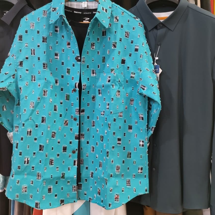3D punched fabric for men's shirts, fashion apparel, available in knit, cotton, and woven materials for processing.
