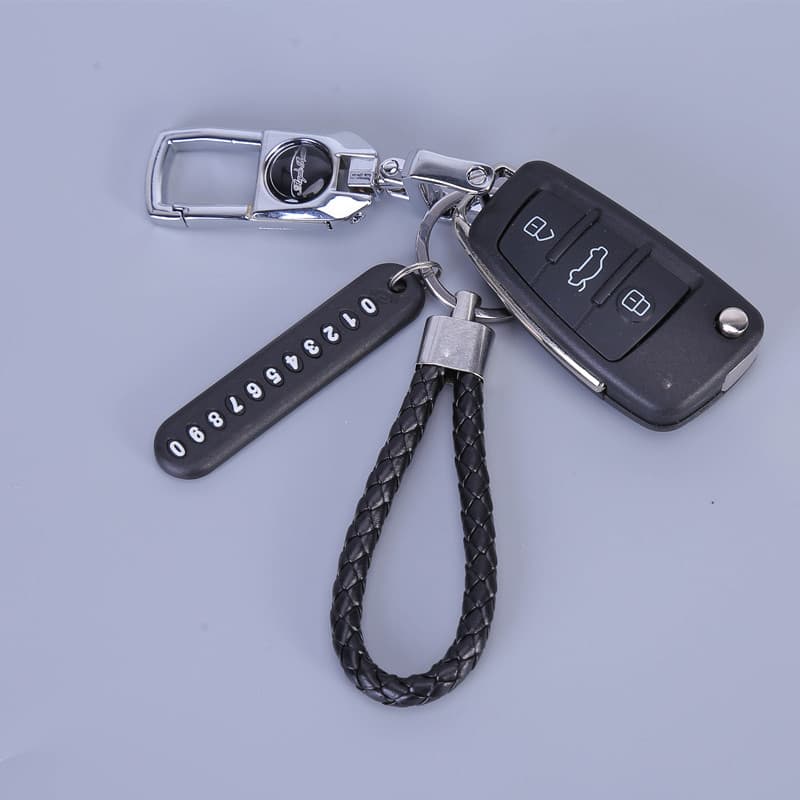 A drop-shipping creative gift car keychain for men and women key chain waist hanging metal anti-lost number plate pendant