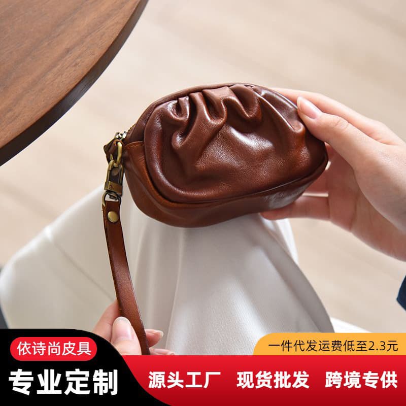 Popular first-layer cowhide large-capacity wrist bag retro portable storage bag simple zipper pleated coin purse