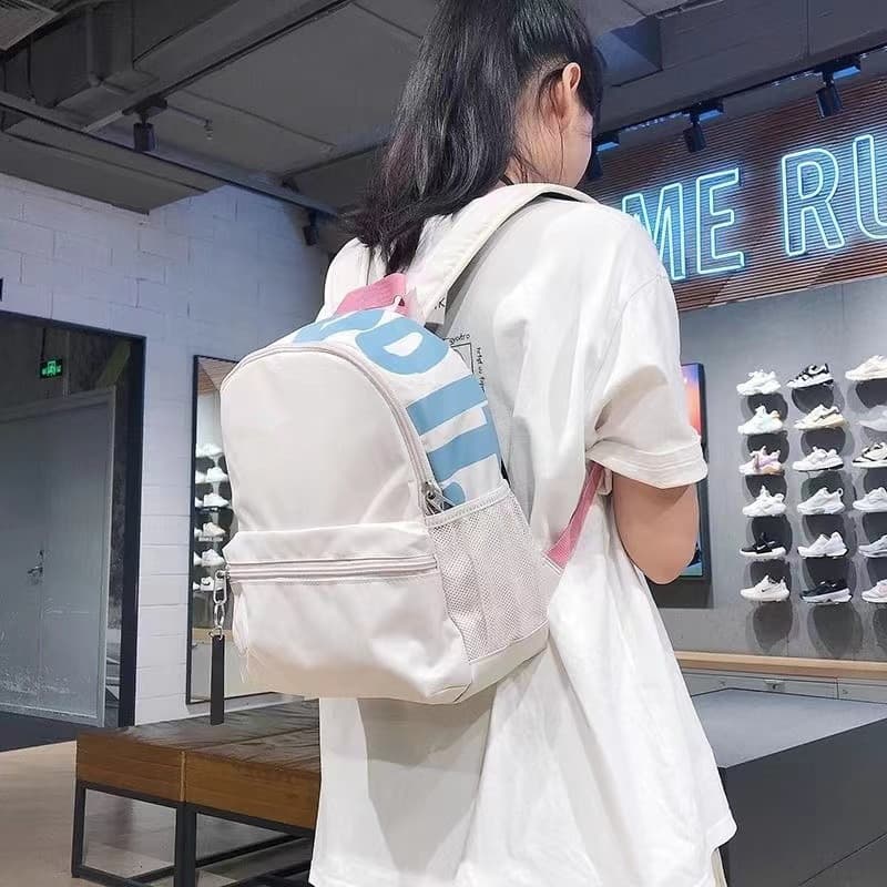 Cross-border new large-capacity children's schoolbag casual male and female kindergarten student backpack versatile high version small book