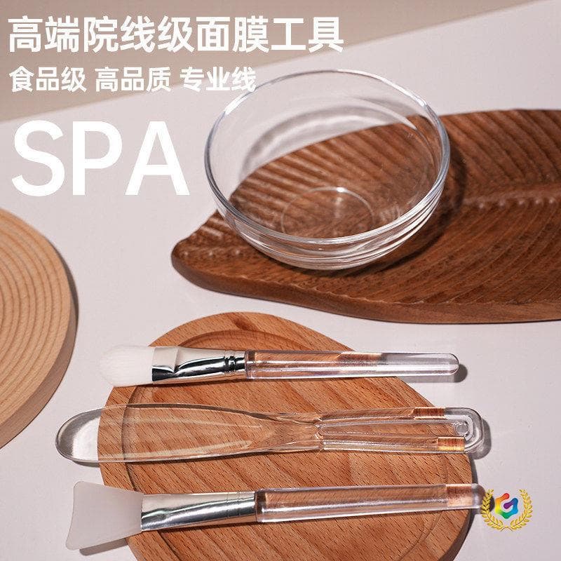 A stylish small DIY beauty salon spa mask mixing bowl, spoon, and brush set.