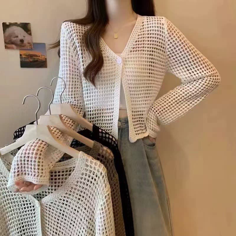 Summer hollow knitted blouse long-sleeved solid color one button outer pure desire V-neck new hot girl top air-conditioning shirt