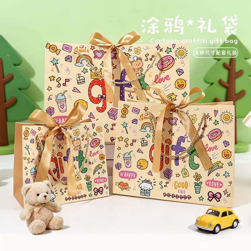Cute expression graffiti gift bag, thickened handbag, children's birthday gift bag, gift storage bag