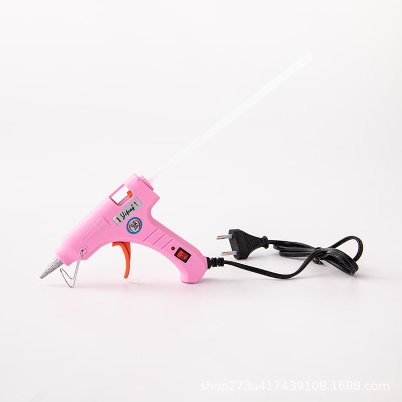 Mini hot glue gun for children's use, hot melt glue sticks, DIY manual household essential, compact version.