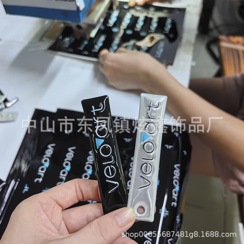 Manufacturer custom long black reflective tag, cartoon anime voltage-sensitive sponge PVC bag charm advertising gifts