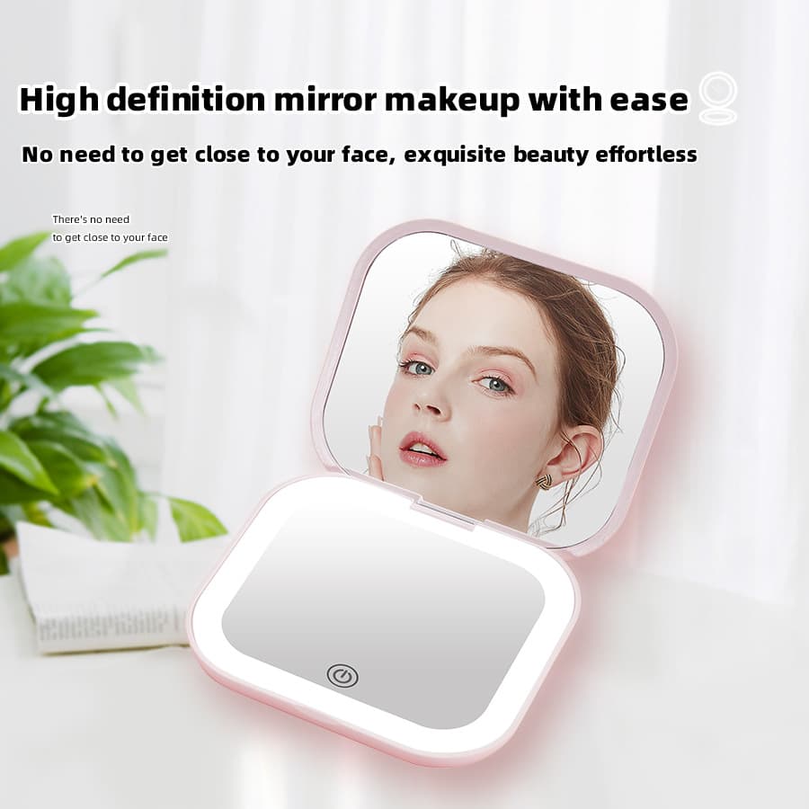 Handheld flip-top LED makeup mirror, portable and rechargeable, a popular cross-border e-commerce mirror.