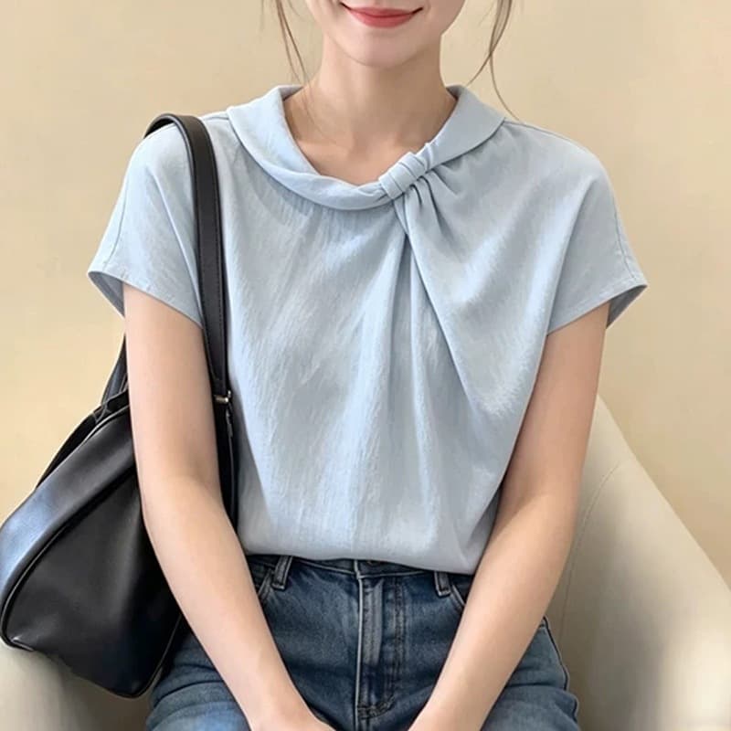 French blue stand-up collar pleated short-sleeved shirt for women 2026 summer new style huge good-looking design commuting top