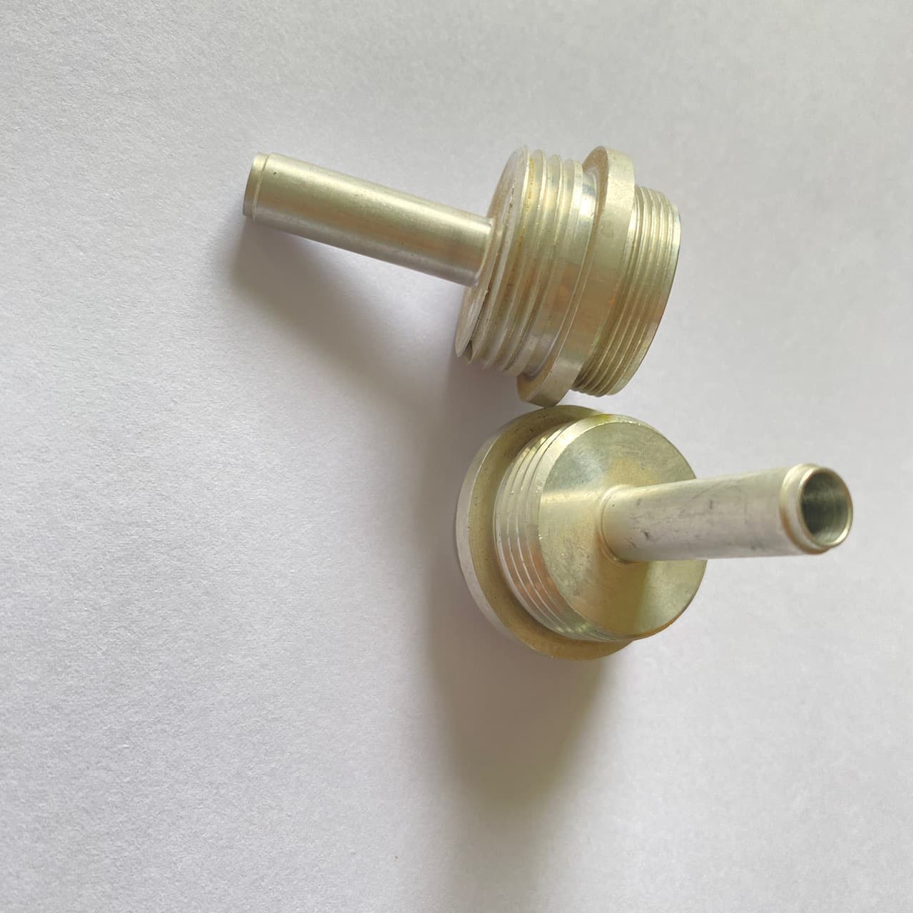 CNC machining of precision mechanical parts, including drive shaft components.