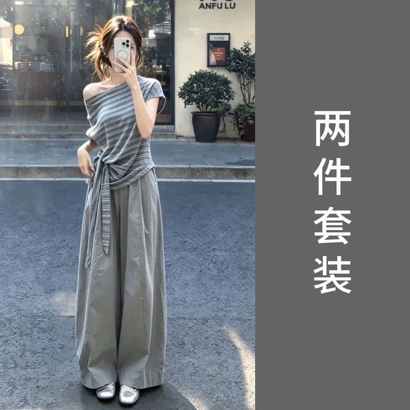 Korean style looks great and looks great in a complete set of new oblique shoulder striped short-sleeved T-shirts for women, summer wide-leg pants suits, slimming