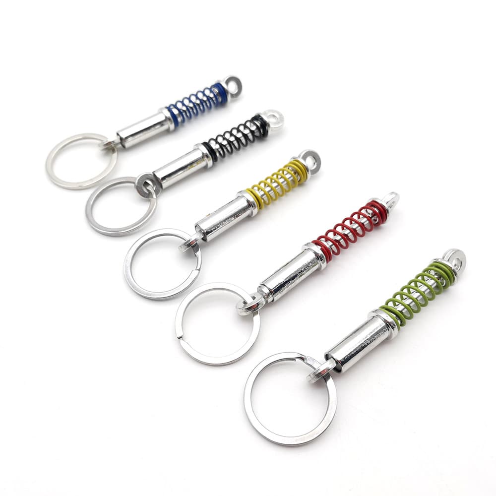 Car modification parts spring old shock absorber shock absorber zinc alloy model key chain pendant ready stock wholesale