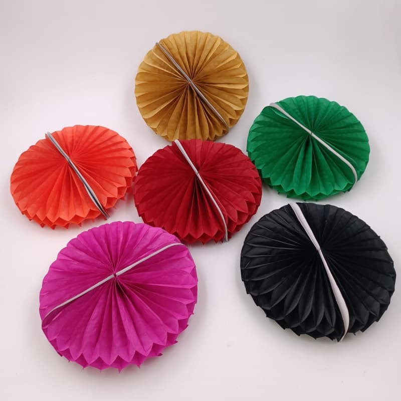 Holiday party decorations, honeycomb base, colored paper honeycomb ornaments, table decorations.