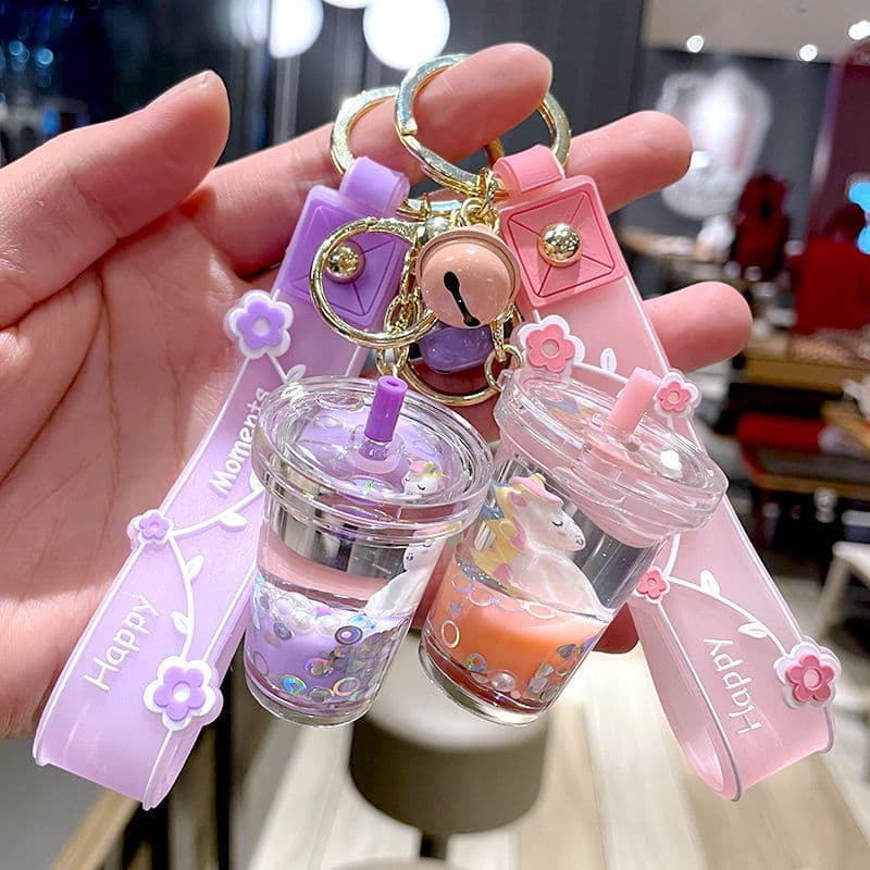 Cute crystal unicorn milk tea cup keychain for women, exquisite quicksand schoolbag pendant, cross-border jewelry, internet celebrity couple