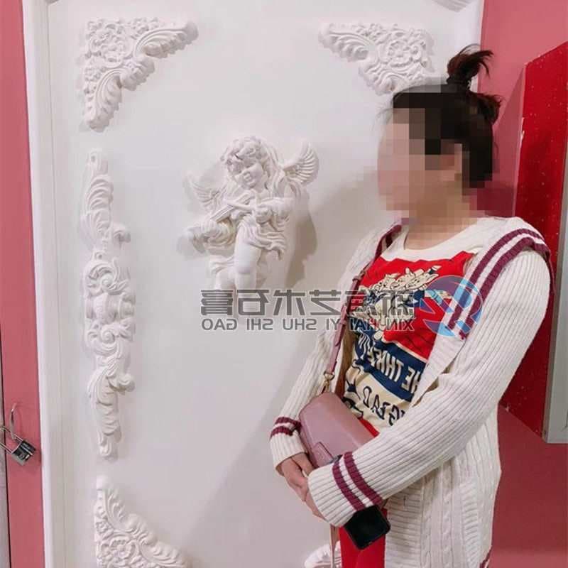 European French Plaster Wall Flower Relief Sculpture of Little Cupid Playing Trumpet and Violin Child