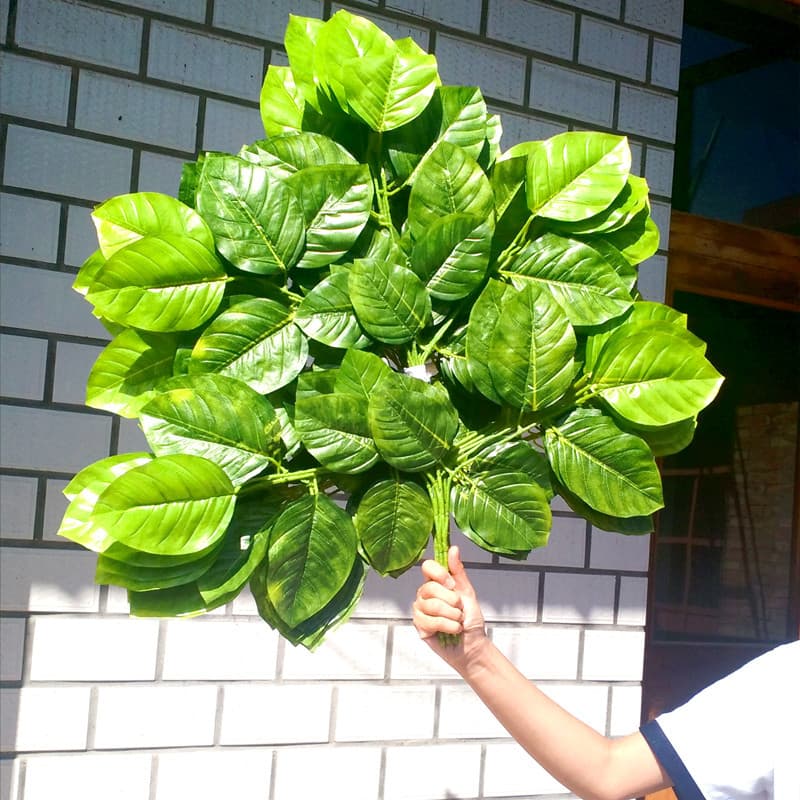 Simulated magnolia leaves, persimmon leaves, fake branches and leaves, artificial green plants, autumn decoration, landscaping and green leaves wholesale