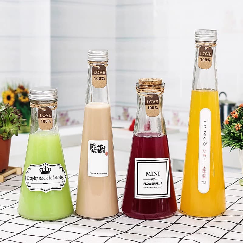 Conical beverage bottles with aluminum caps, glass juice bottles, teardrop-shaped sesame oil bottles, and glass milk tea/wine bottles specifically designed for milk tea shops.