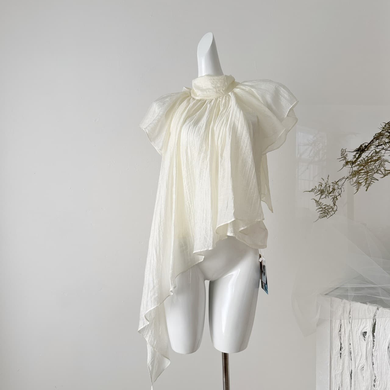 French-style irregular ribbon short-sleeve blouse for women, designed with a stylish and slimming fit