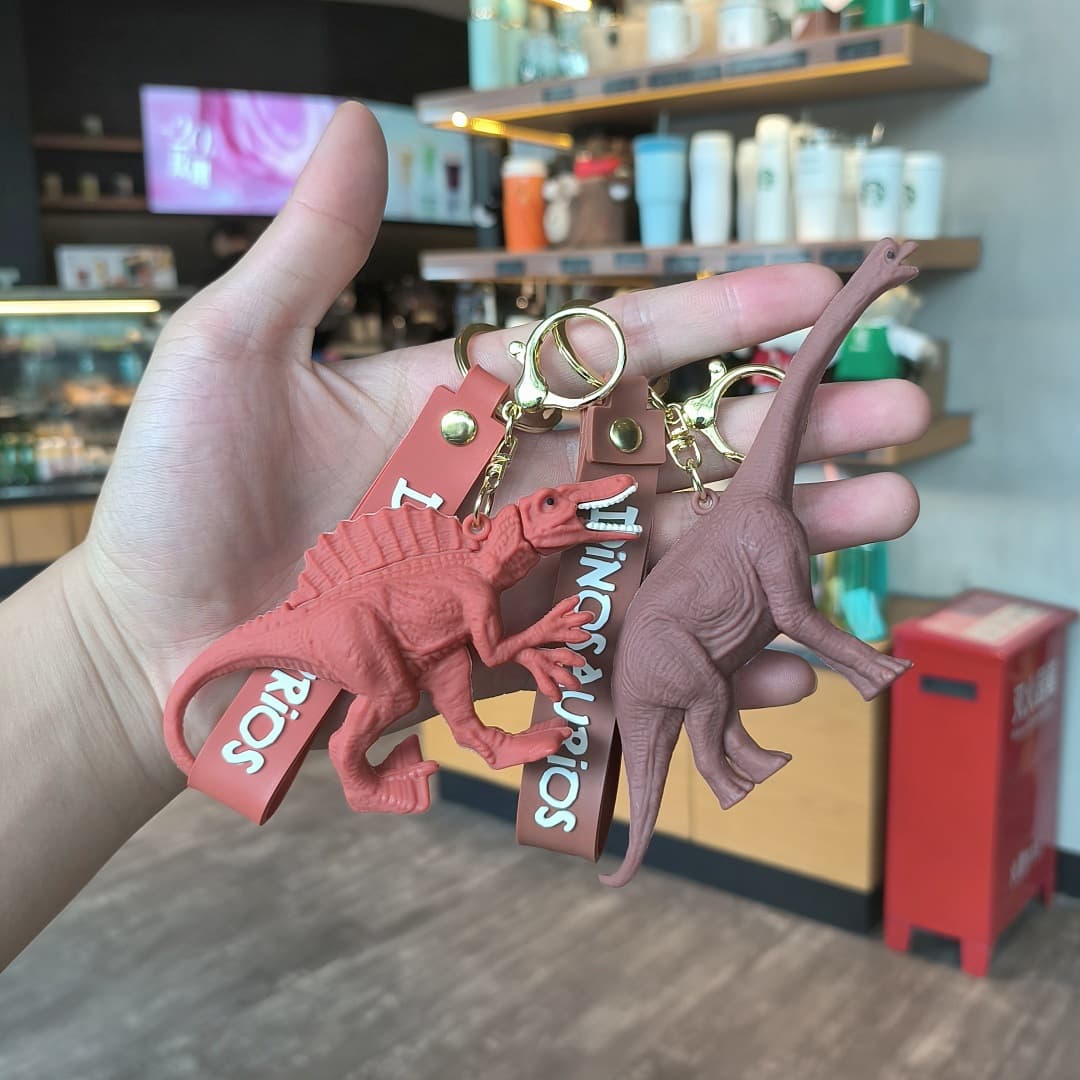 Cartoon simulation Jurassic dinosaur key chain pendant Tyrannosaurus rex student school bag key chain pendant floor push gift