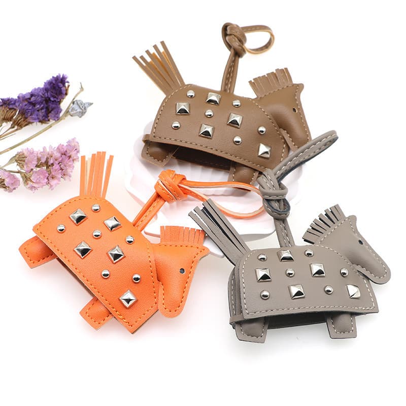 New leather pony pendant car pendant key PU rivet war horse women's bag pendant big brand same style h home