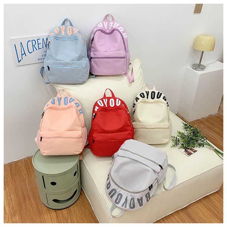 Japanese all-match solid color backpack fashion backpack women's simple lightweight wear-resistant commuter large capacity backpack