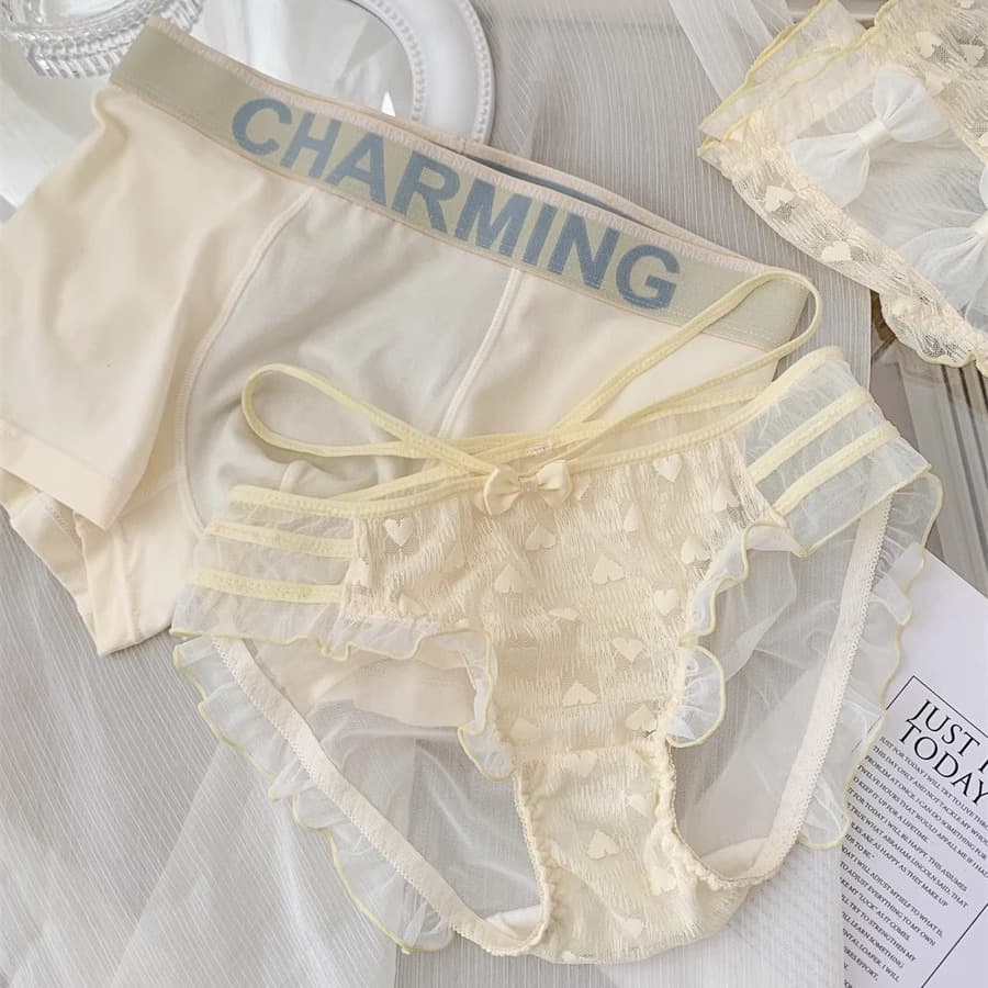 Sexy and alluring couple underwear, male and female, hollowed-out mesh, thin summer style, sweet and romantic triangle panties with straps.