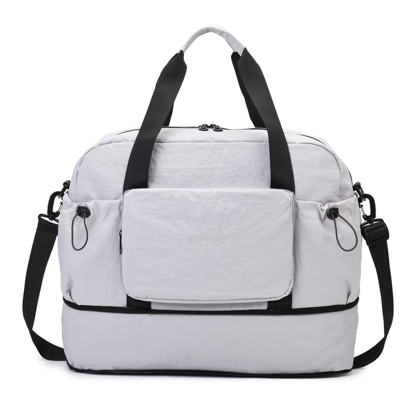 Travel bag 2025 new style lightweight portable large capacity foldable luggage storage bag dry and wet separation fitness bag trendy
