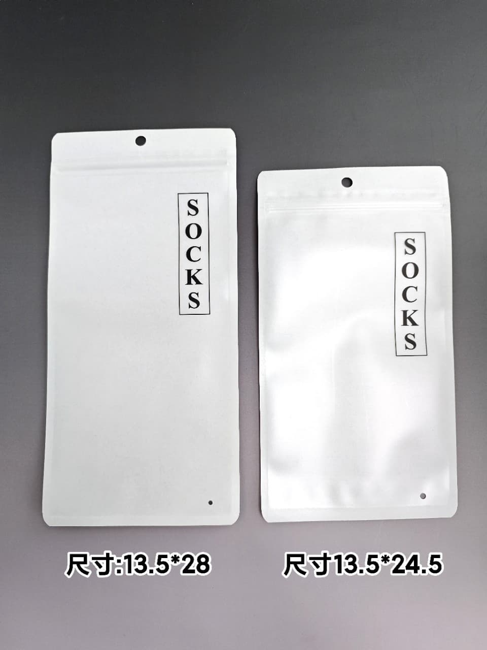 Individually packaged socks in three-side sealed composite white kraft paper high-end sock packaging, perfect for gifting.