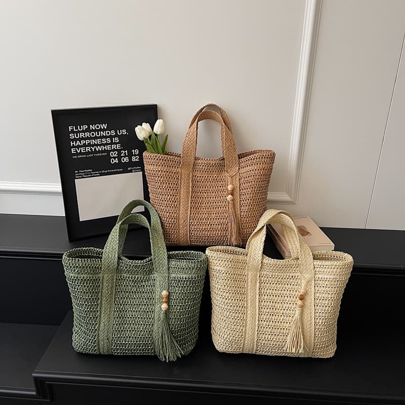 Cross-border new women's bag simple large capacity lightweight woven bucket beach bag trendy straw new portable shoulder bag