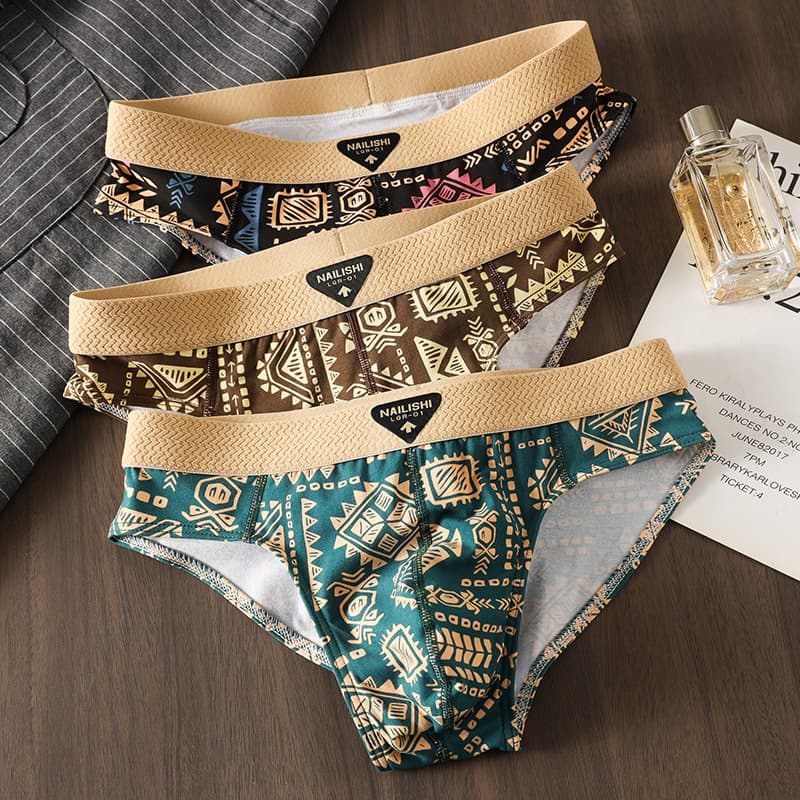 Men's triangle underwear with ethnic style, trendy, cotton breathable youth mid-waist triangle shorts.