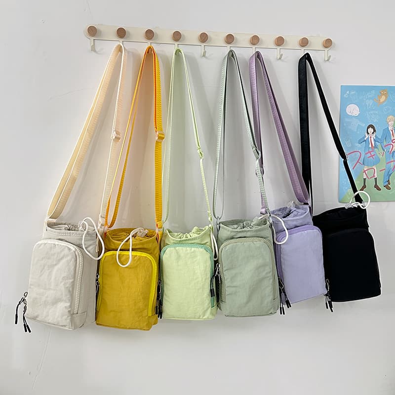 New drawstring crossbody phone bag/water bottle cooler bag for men and women, portable nylon shoulder bag/storage bag for sports and outdoor use.