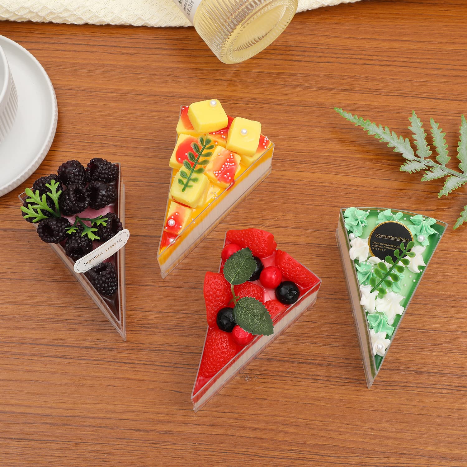 Triangular mousse box with height cut into pieces, strawberry cake, black forest dream dragon cake roll packaging box