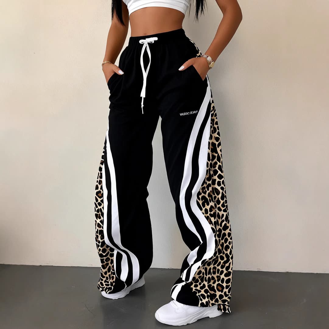 Plus-size sporty striped leopard print elastic waist pants, a popular style in Europe and America, featuring a unique loose drawstring casual design for women.