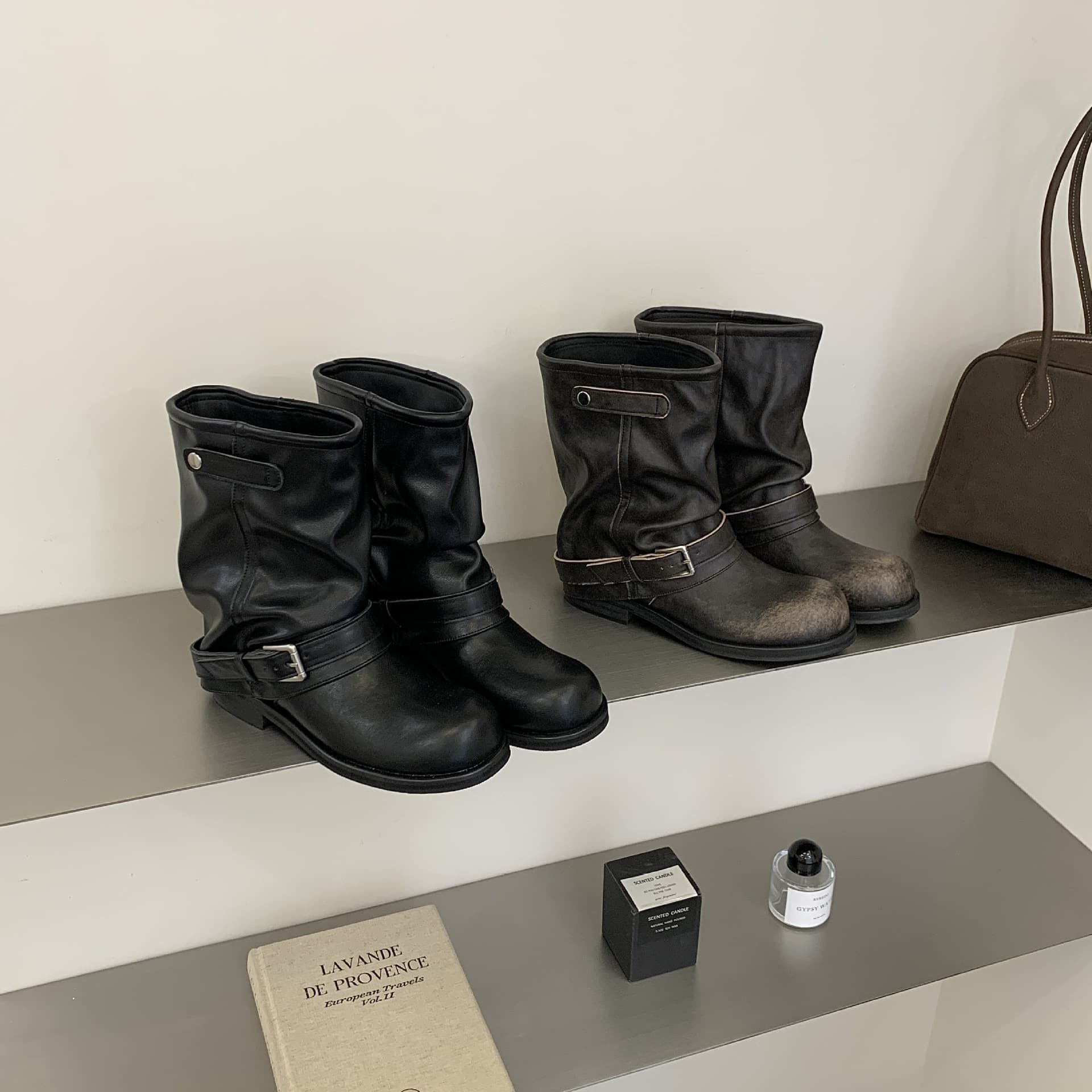 Atmospheric cowhide buckle pile boots short pleats 2026 Korean niche design trouser short boots women black