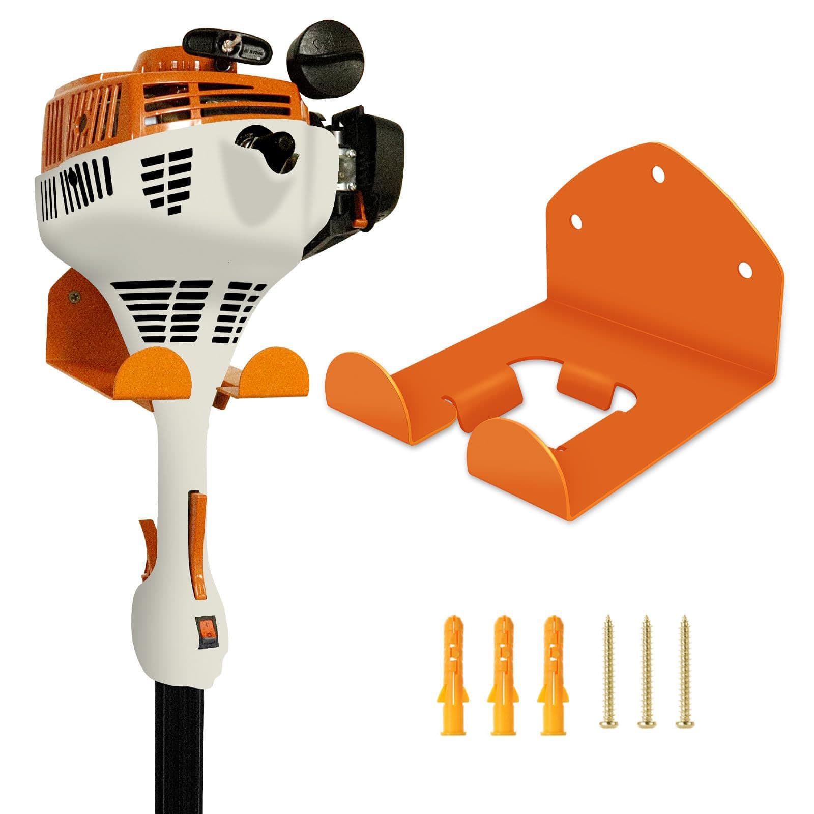 Garage organizer wall-mounted rack for lawnmowers, trimmers, and garage tools.