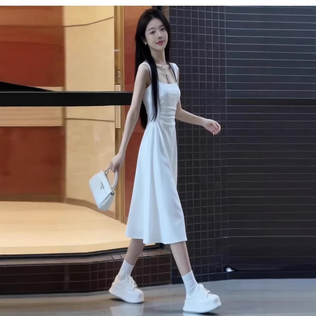 2026 spring and summer new French retro Hepburn style little black dress waist slimming long skirt black suspender dress for women