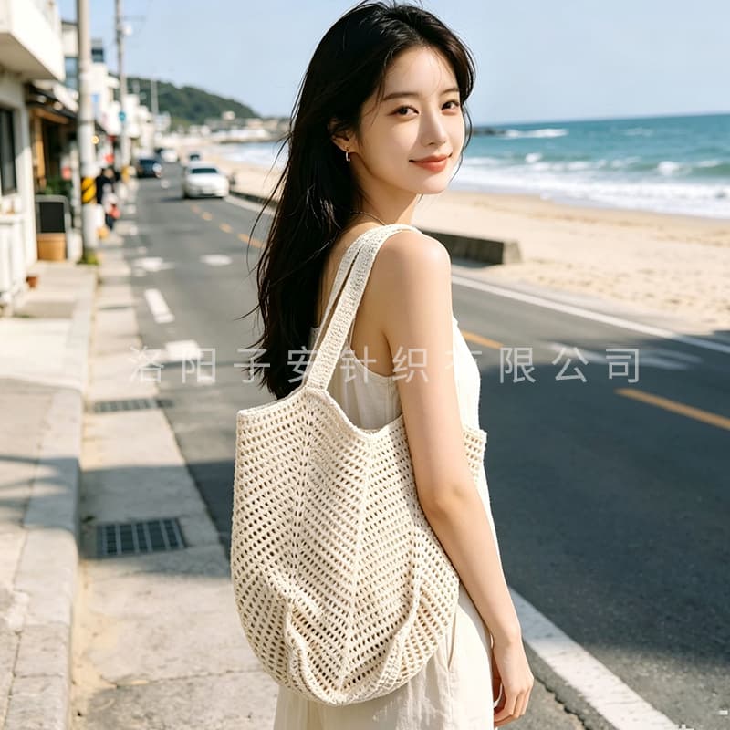 Large-capacity woven bag summer niche design hollow straw bag seaside travel shoulder tote bag handbag