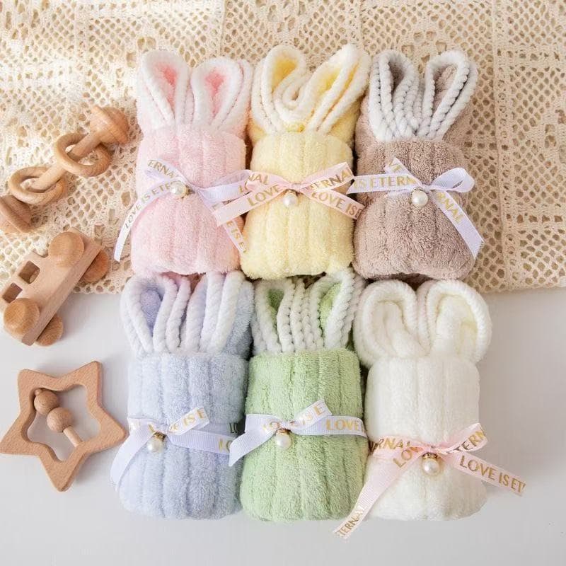 Cute bunny-shaped towels as a gift, birthday present, wedding favor, or creative opening gift for kindergarten.