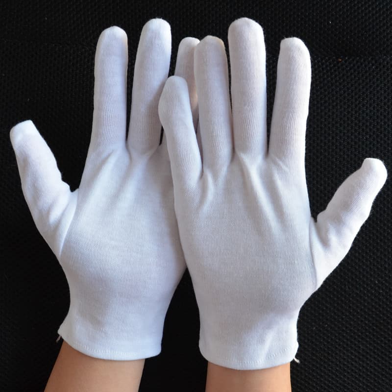 Manufacturer of jersey cotton gloves, 100% cotton formal gloves, and pure cotton work gloves for collecting and playing with beads.