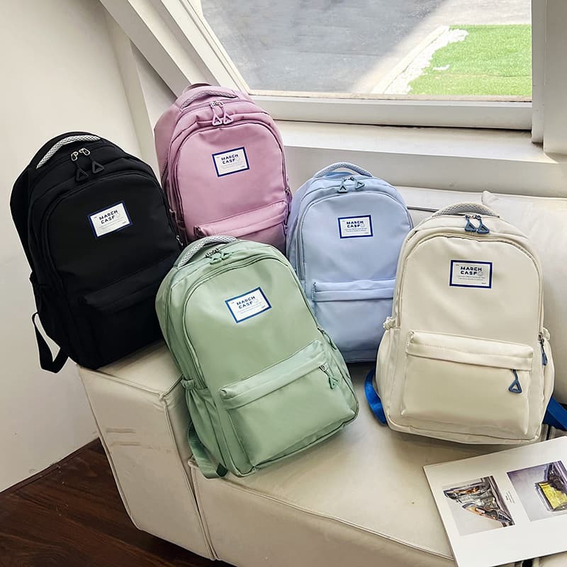 Fashionable and simple solid color backpack new travel lightweight backpack campus large capacity student school bag wholesale for women