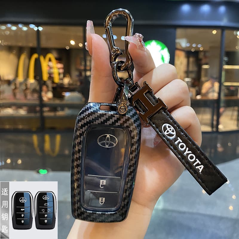 Suitable for Toyota Camry key cover Lei Lingfeng Landa Weilanda Highlander Corolla Rui car bag buckle shell