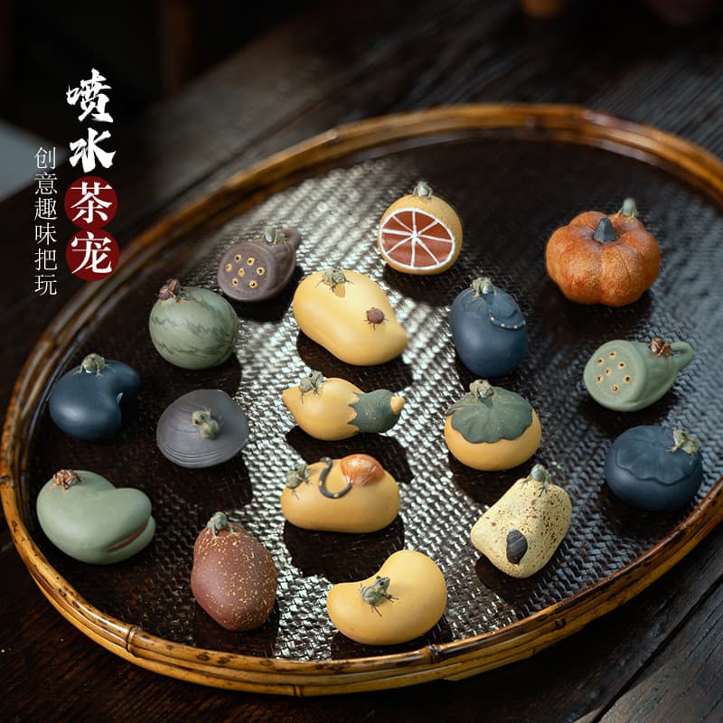 Yixing purple clay tea pets, watermelon ornaments, handmade frogs, pumpkins, lotus seeds, lemons, broad beans, tea sets, sculptures wholesale