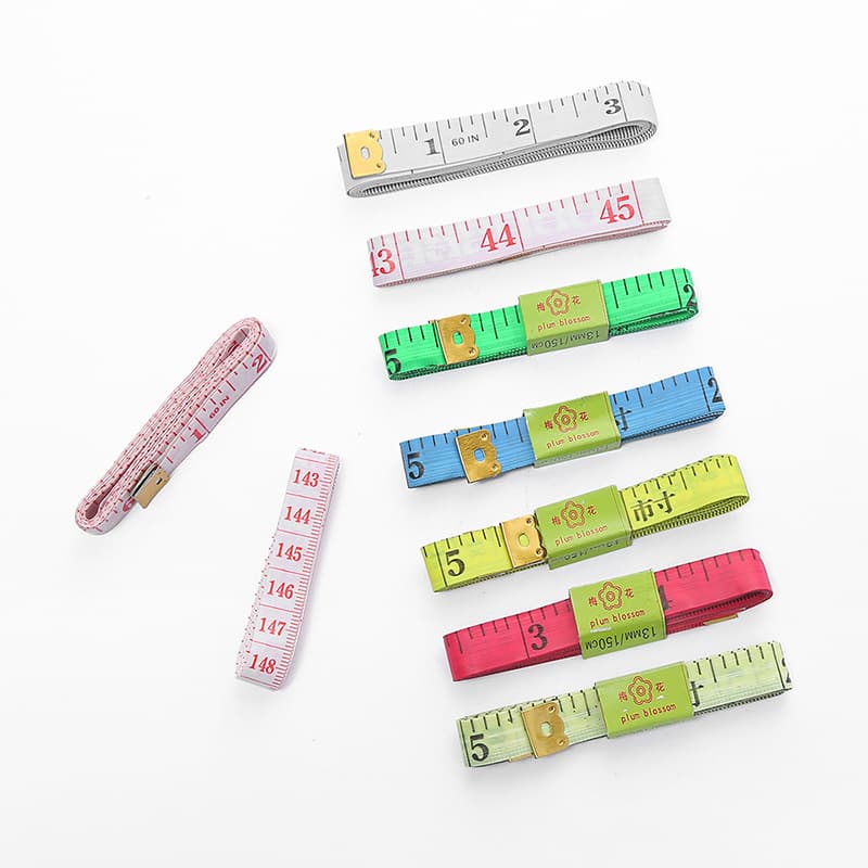 1.5-meter PVC tailor's ruler for measuring bust, waist, and hip measurements. Portable mini double-scale measuring tape.