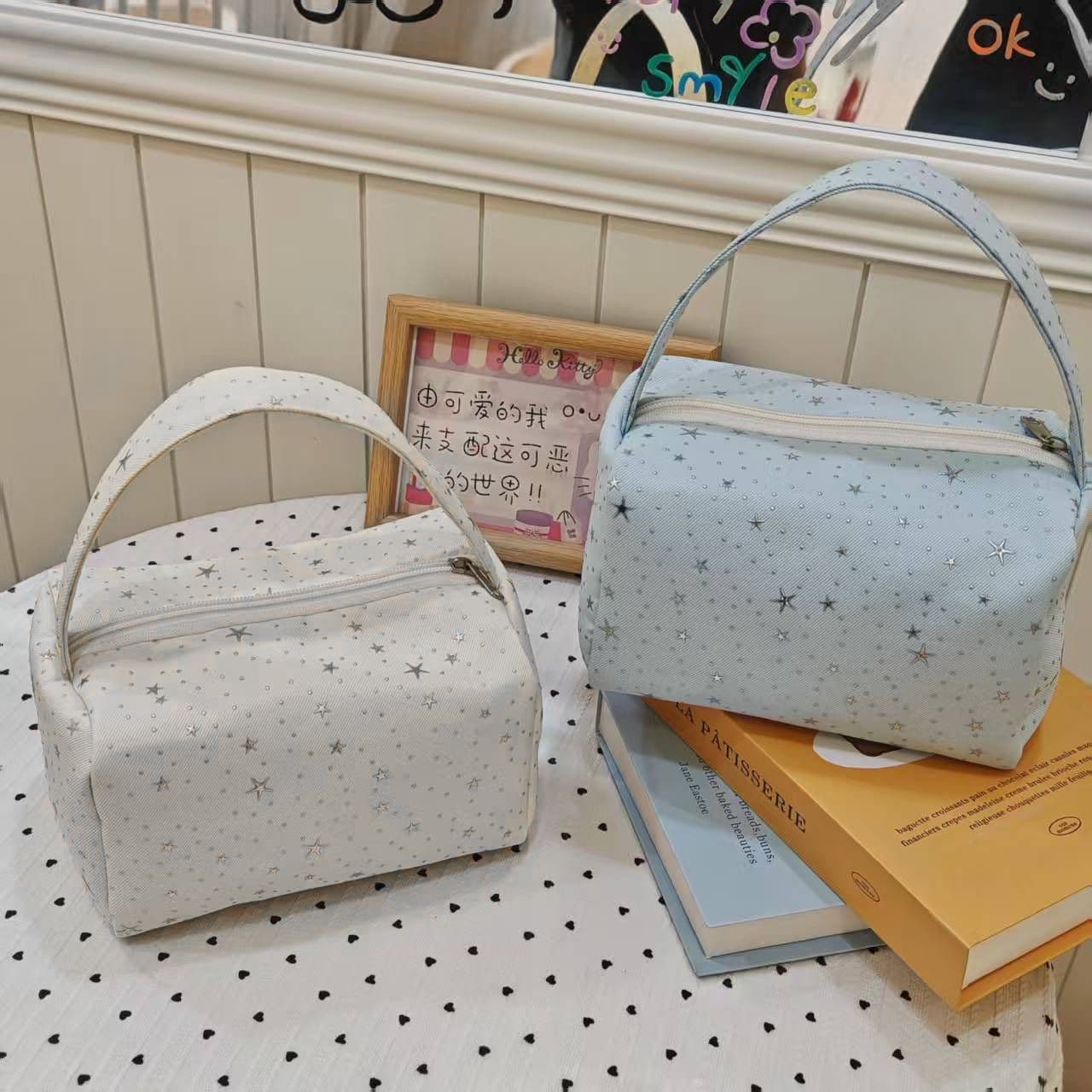 Spring style storage hand-held cosmetic bag, women's portable hand-held star large-capacity cosmetic storage bag, travel toiletry bag